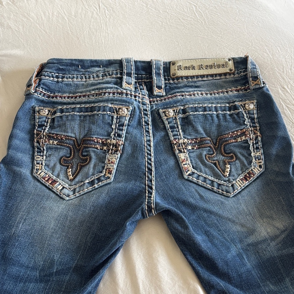 Rock Revival Distressed Blue Jeans with Embroidered Pockets
